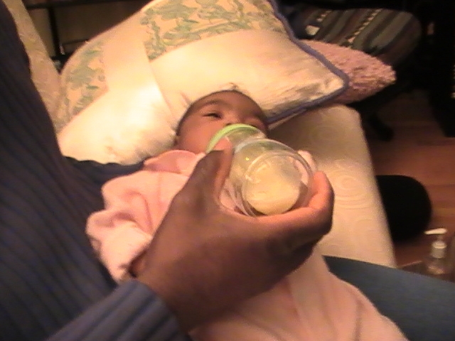 More Mikayla_420.JPG - Our first attempt at bottle feeding with breast milk.  Mikayla wasn't having any of it  :-|  Second and subsequent attempts were much better.  Yeah! Now I can help out with the night feedings.  I'm actually looking forward to them...though I may have a different opinion in a few months...  ;^)